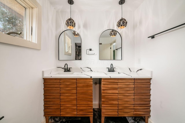 1571 Vinton Ave, Columbus, OH 43220 - bathroom with double vanity and baseboards