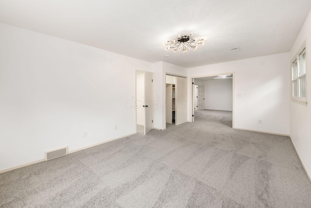 1571 Vinton Ave, Columbus, OH 43220 - spare room featuring light carpet and baseboards
