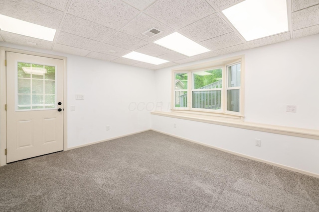 1571 Vinton Ave, Columbus, OH 43220 - spare room with carpet, a drop ceiling, and plenty of natural light