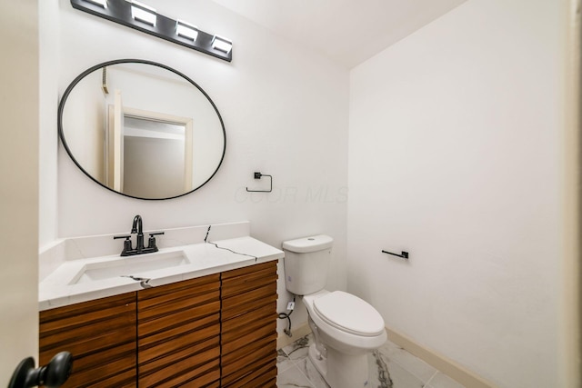 1571 Vinton Ave, Columbus, OH 43220 - half bathroom featuring vanity and marble finish floors