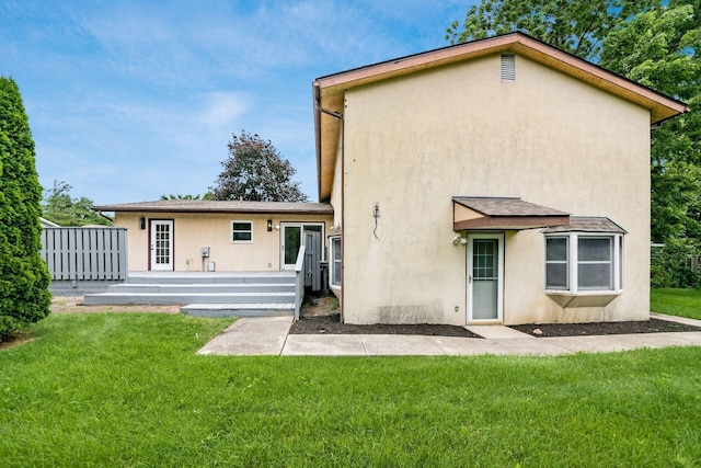 1571 Vinton Ave, Columbus, OH 43220 - rear view of property featuring stucco siding
