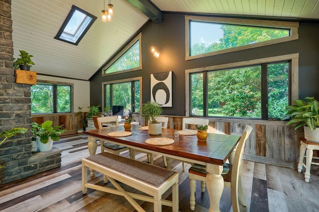 1300 Dannie Dr, Logan, OH 43138 - dining area with a skylight, high vaulted ceiling, wood-type flooring, and a wooden ceiling with exposed beams