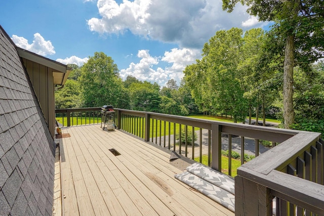 1300 Dannie Dr, Logan, OH 43138 - wooden deck featuring view of wooded area and a lawn