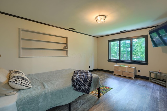1300 Dannie Dr, Logan, OH 43138 - bedroom with wood finished floors and ornamental molding