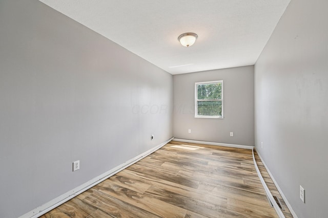 330 Tralee Trl, Cardington, OH 43315 - unfurnished room with light wood-style flooring and baseboards