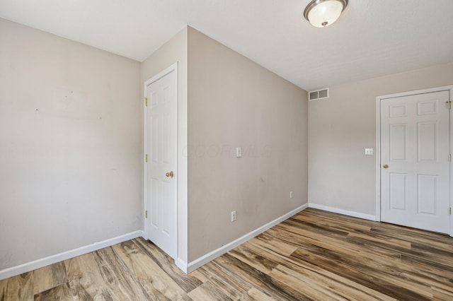 330 Tralee Trl, Cardington, OH 43315 - empty room with wood finished floors and baseboards