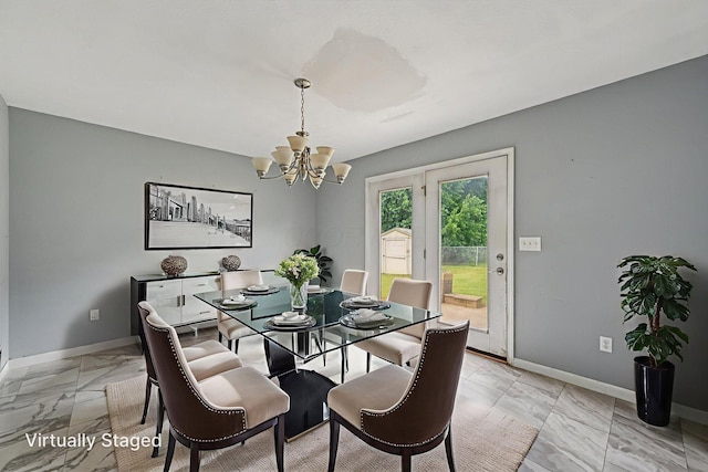 330 Tralee Trl, Cardington, OH 43315 - dining area with a chandelier and light marble finish flooring
