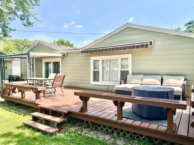 3811 Bradford Dr, Hilliard, OH 43026 - rear view of house featuring a deck, outdoor dining area, and an outdoor living space