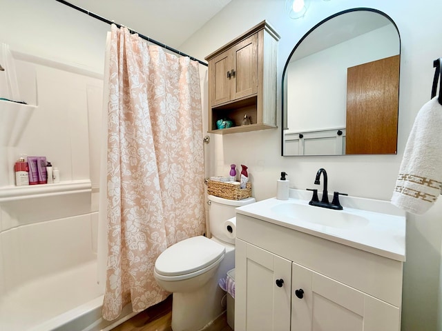 3811 Bradford Dr, Hilliard, OH 43026 - full bath featuring vanity, wood finished floors, and shower / tub combo with curtain