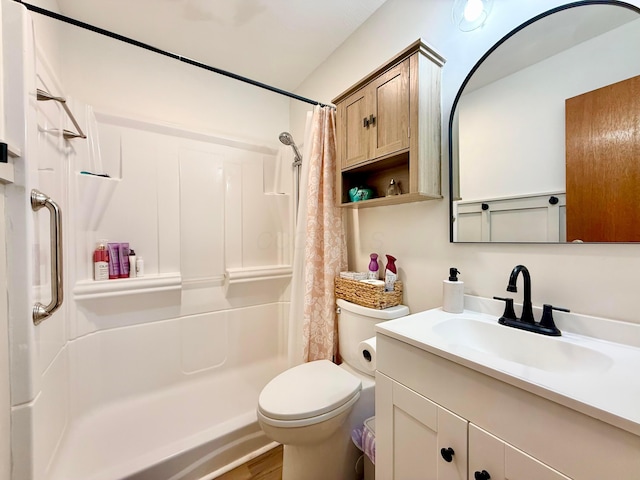 3811 Bradford Dr, Hilliard, OH 43026 - full bathroom with vanity, a shower with curtain, and wood finished floors