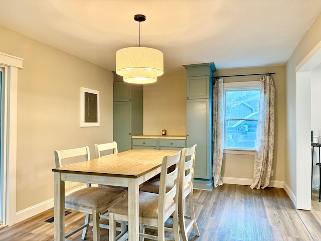 3811 Bradford Dr, Hilliard, OH 43026 - dining area featuring electric panel and wood finished floors