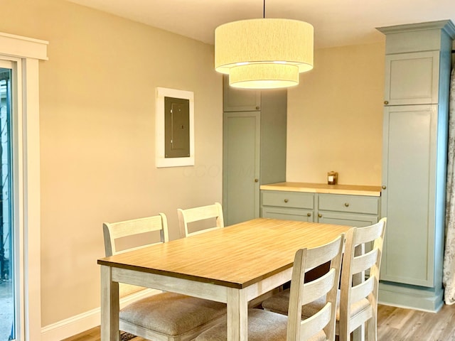 3811 Bradford Dr, Hilliard, OH 43026 - dining area featuring electric panel and light wood-style flooring