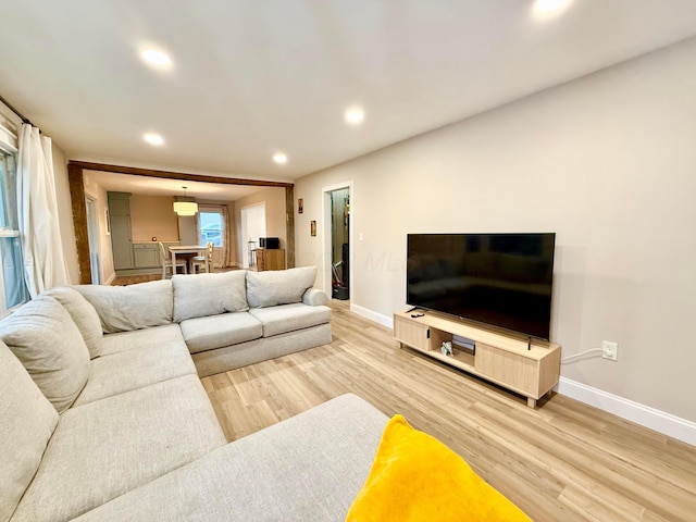 3811 Bradford Dr, Hilliard, OH 43026 - living room featuring light wood finished floors and recessed lighting