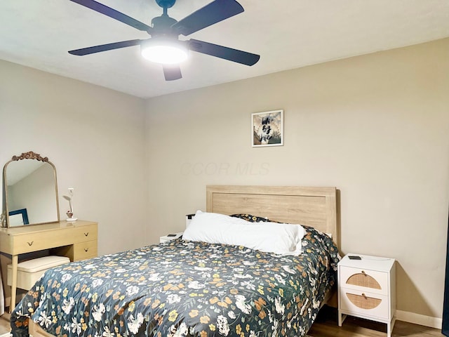 3811 Bradford Dr, Hilliard, OH 43026 - bedroom with wood finished floors and ceiling fan