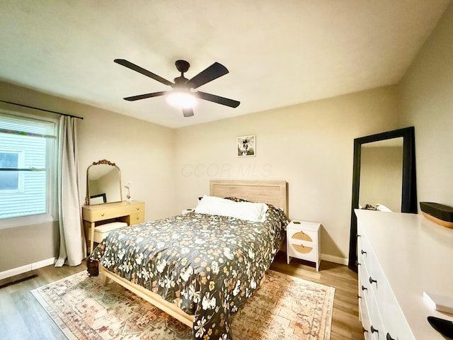 3811 Bradford Dr, Hilliard, OH 43026 - bedroom with light wood-type flooring and ceiling fan