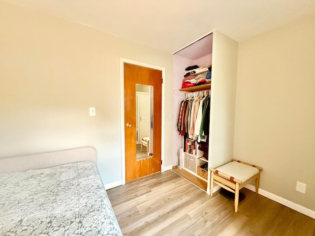 3811 Bradford Dr, Hilliard, OH 43026 - unfurnished bedroom featuring light wood-style flooring and a closet