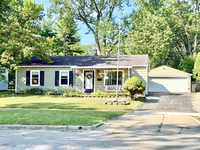 3811 Bradford Dr, Hilliard, OH 43026 - ranch-style house with covered porch, an outdoor structure, a garage, a front lawn, and a shingled roof