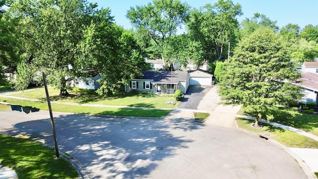 3811 Bradford Dr, Hilliard, OH 43026 - view of front of property featuring a garage and a front lawn