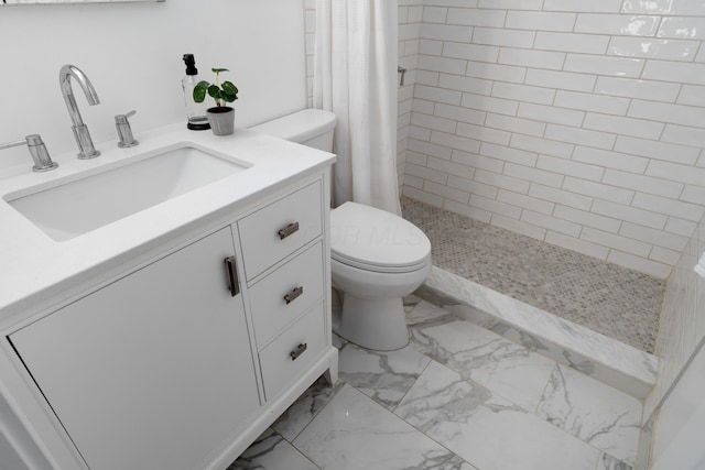 251 Detroit Ave, Columbus, OH 43201 - bathroom featuring marble finish flooring, a tile shower, and vanity