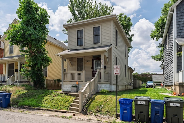 251 Detroit Ave, Columbus, OH 43201 - american foursquare style home featuring covered porch and a front lawn