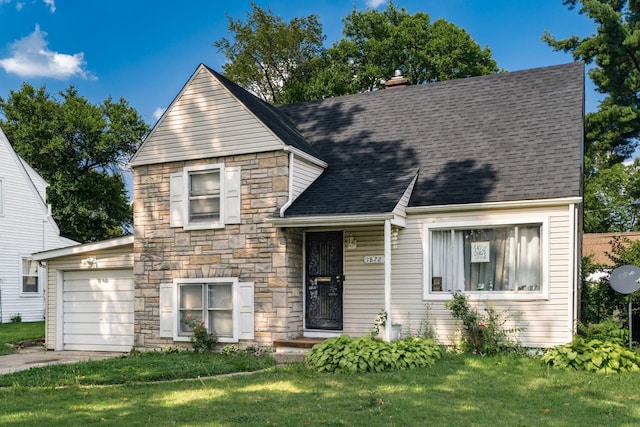 1872 Greenway Ave S, Columbus, OH 43219 - view of front of house featuring stone siding, an attached garage, a front lawn, and a shingled roof