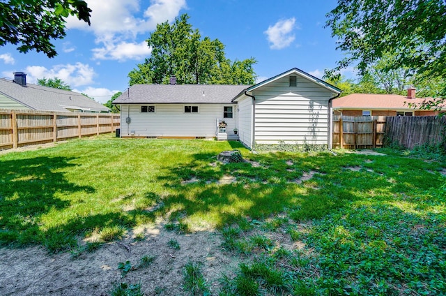 4851 Hillcrest St N, Hilliard, OH 43026 - rear view of house with a fenced backyard