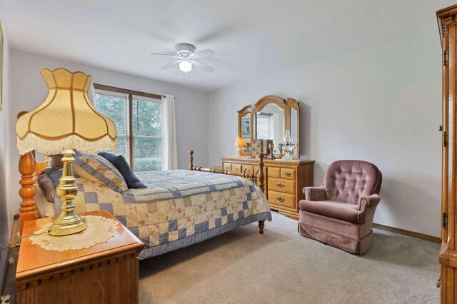 6658 Ridpath Rd, Grove City, OH 43123 - carpeted bedroom featuring ceiling fan and baseboards