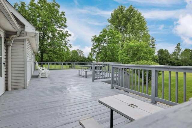 6658 Ridpath Rd, Grove City, OH 43123 - wooden deck featuring a yard