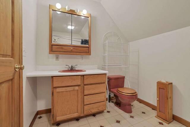 6658 Ridpath Rd, Grove City, OH 43123 - bathroom featuring vaulted ceiling and vanity