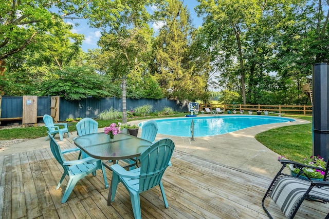 1318 Hickory Ridge Ln, Columbus, OH 43235 - view of pool with a deck, a fenced backyard, view of scattered trees, and outdoor dining area