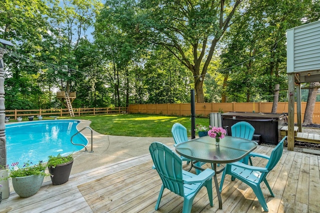 1318 Hickory Ridge Ln, Columbus, OH 43235 - deck with a hot tub, a fenced backyard, view of scattered trees, and outdoor dining space