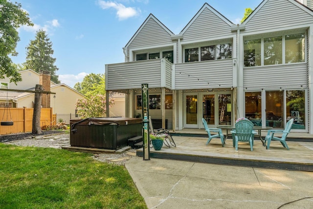1318 Hickory Ridge Ln, Columbus, OH 43235 - rear view of house with a hot tub, a deck, and a balcony