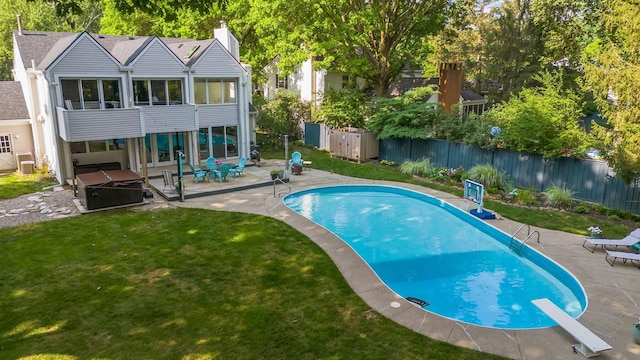 1318 Hickory Ridge Ln, Columbus, OH 43235 - view of swimming pool featuring a jacuzzi, a fenced backyard, a patio area, and a diving board