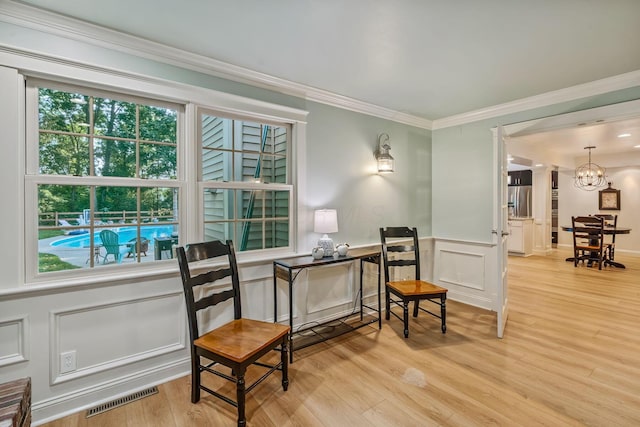 1318 Hickory Ridge Ln, Columbus, OH 43235 - office space with a chandelier, crown molding, wood finished floors, a decorative wall, and wainscoting