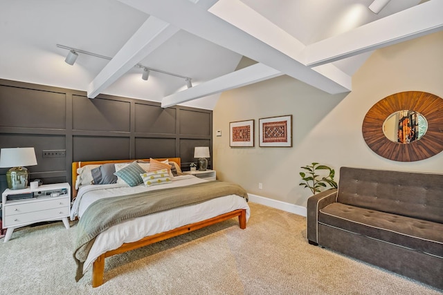 1318 Hickory Ridge Ln, Columbus, OH 43235 - carpeted bedroom featuring track lighting and a decorative wall