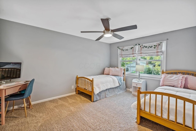 1318 Hickory Ridge Ln, Columbus, OH 43235 - carpeted bedroom featuring an office area and a ceiling fan
