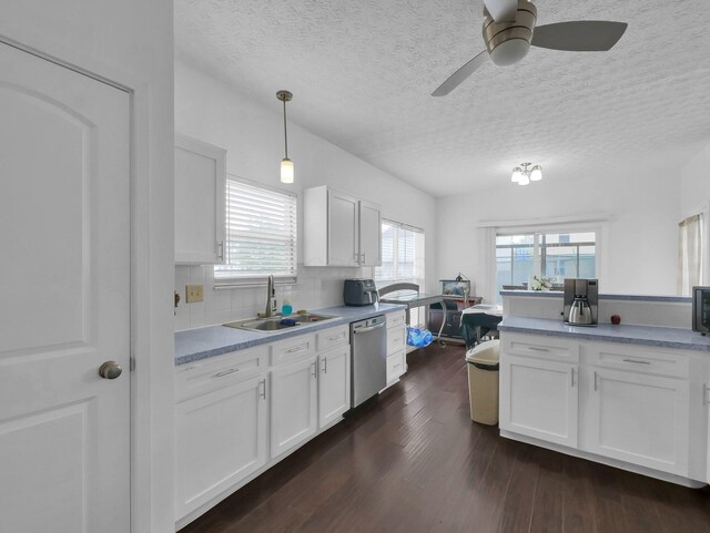 3136 Fabyan Dr, Reynoldsburg, OH 43068 - kitchen featuring stainless steel dishwasher, ceiling fan, white cabinets, dark wood finished floors, and a textured ceiling