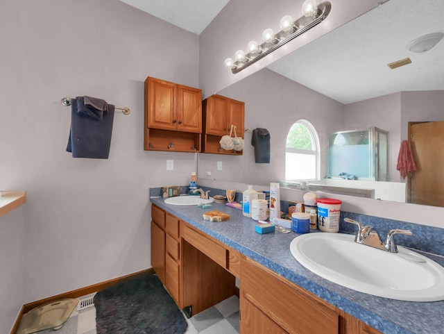 3136 Fabyan Dr, Reynoldsburg, OH 43068 - full bathroom with double vanity and a shower with door