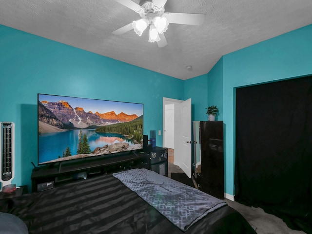 3136 Fabyan Dr, Reynoldsburg, OH 43068 - carpeted bedroom with a textured ceiling and a ceiling fan