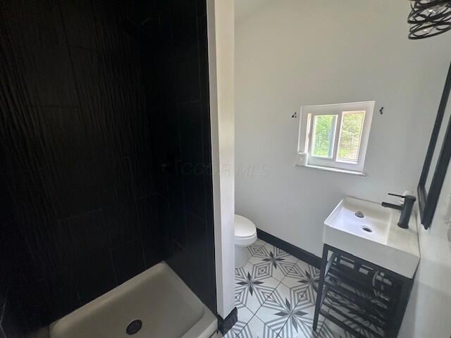 959 Kelton Ave, Columbus, OH 43206 - bathroom with vanity, a stall shower, and tile patterned flooring