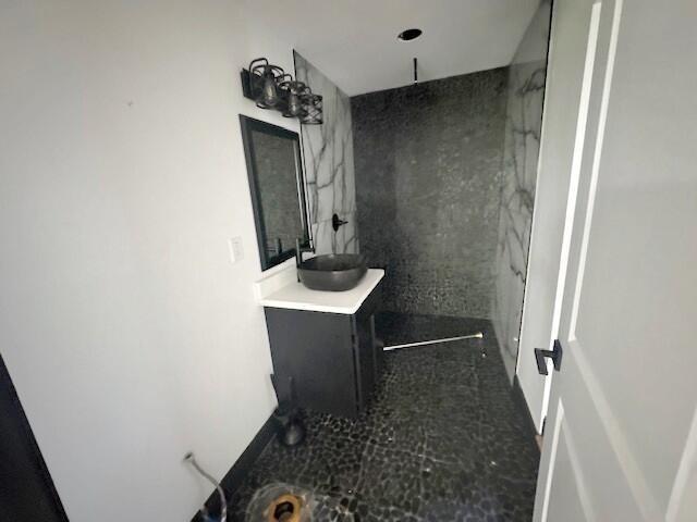 959 Kelton Ave, Columbus, OH 43206 - full bathroom featuring vanity and a marble finish shower