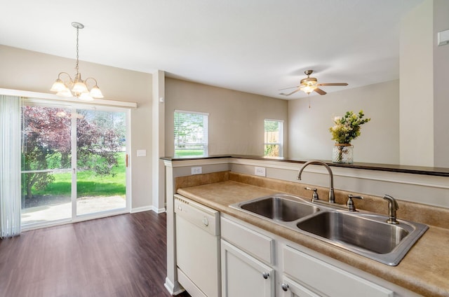 1171 Park Dr, Gahanna, OH 43230 - kitchen with white dishwasher, plenty of natural light, white cabinetry, and decorative light fixtures