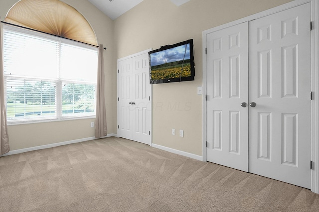 262 Alexander Lawrence Dr, Pickerington, OH 43147 - unfurnished bedroom featuring light colored carpet and two closets