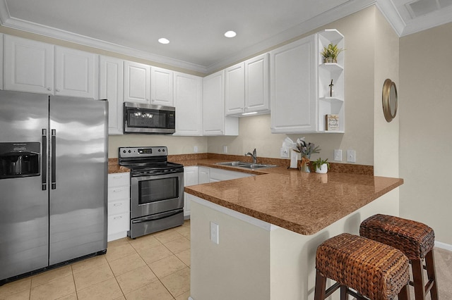 262 Alexander Lawrence Dr, Pickerington, OH 43147 - kitchen featuring stainless steel appliances, open shelves, a peninsula, ornamental molding, and white cabinetry