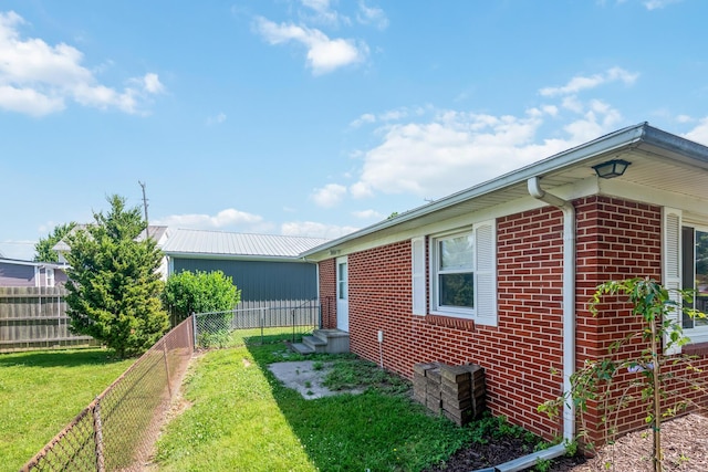 320 W Liberty St, Bucyrus, OH 44820 - view of side of home featuring brick siding