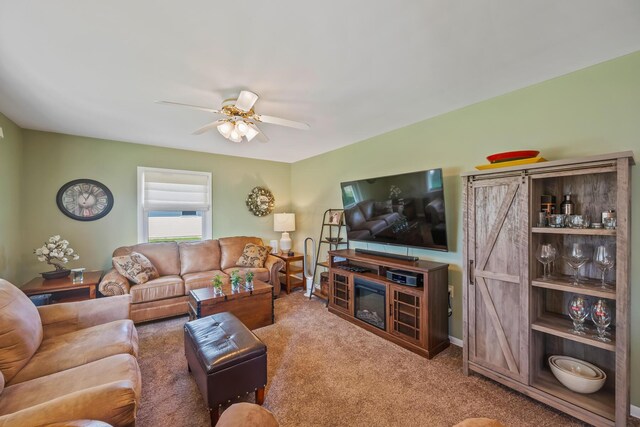 320 W Liberty St, Bucyrus, OH 44820 - living area featuring carpet and a ceiling fan