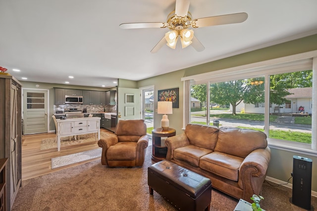 320 W Liberty St, Bucyrus, OH 44820 - living area with ceiling fan, recessed lighting, and light carpet