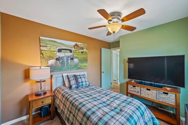 320 W Liberty St, Bucyrus, OH 44820 - bedroom featuring ceiling fan and baseboards