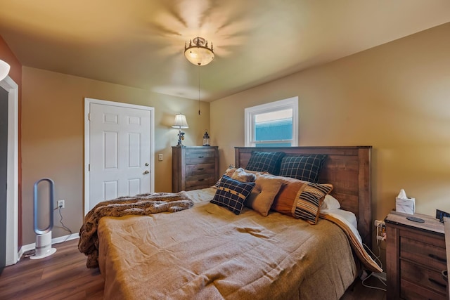 320 W Liberty St, Bucyrus, OH 44820 - bedroom featuring wood finished floors and baseboards