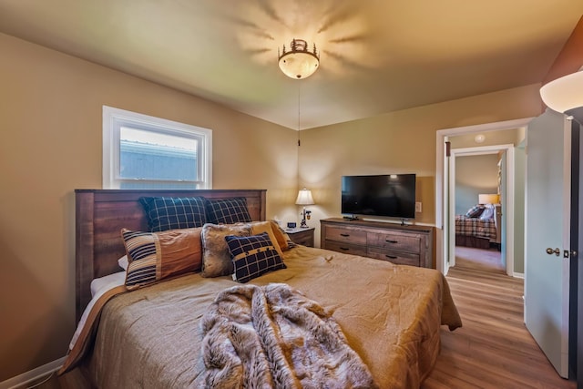 320 W Liberty St, Bucyrus, OH 44820 - bedroom with wood finished floors and baseboards